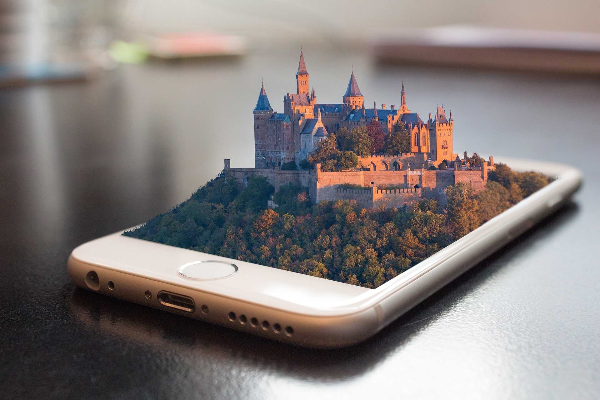An overgrown castle contained in the screen of a phone.